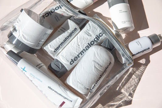 Travel essentials Dermalogica products in a clear plastic bag